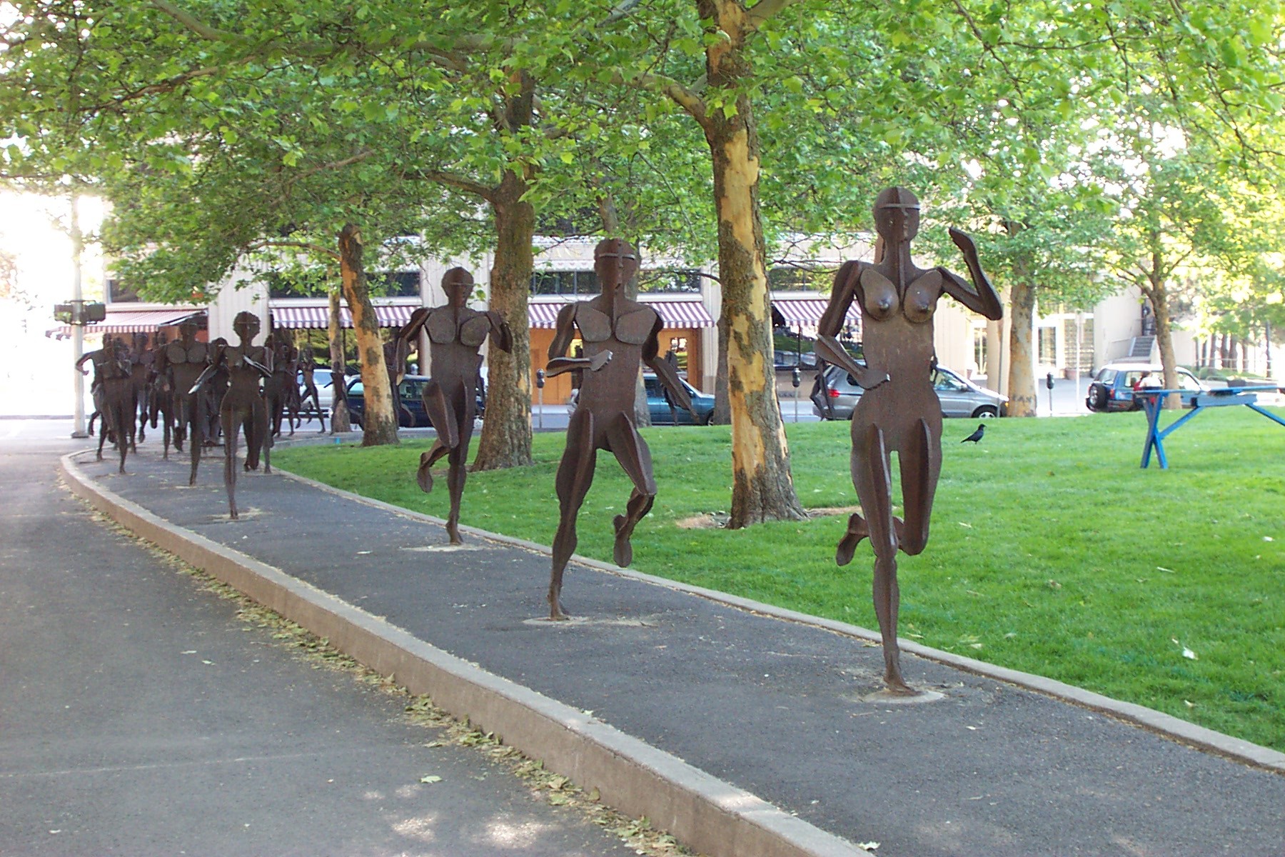 Photo of JOY OF RUNNING TOGETHER statues.